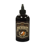 8 Ounce bottle of Anchored Tattoo Stencil Solution